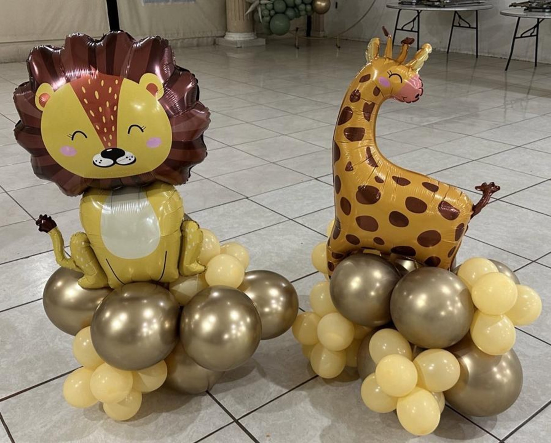 Giraffe and lion balloon bouquets